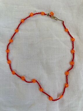 Roxanne Assoulin Red Daisy Camp Bead Necklace with Orange Flower Accents NIB